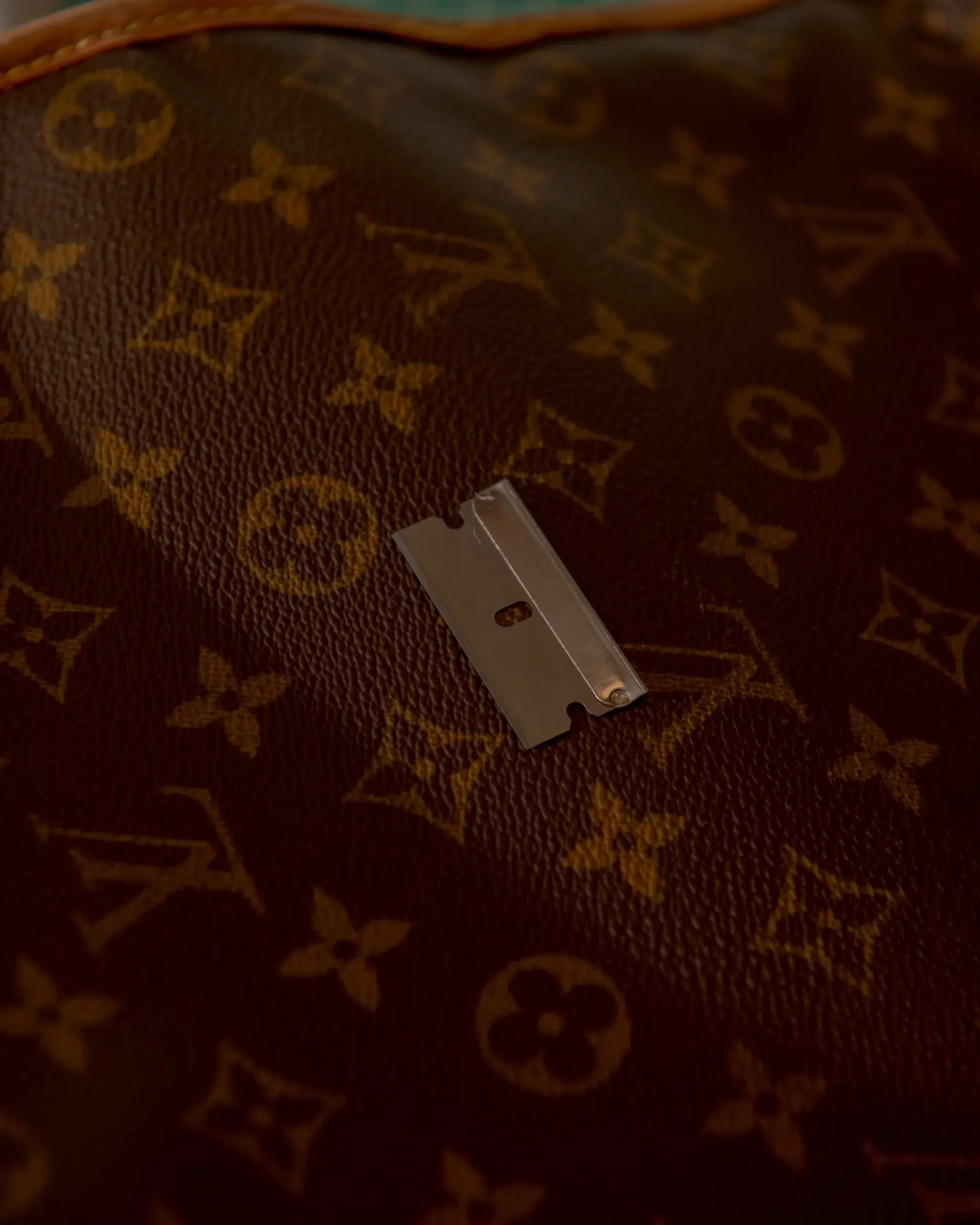 A close up of a Louis Vuitton Hoop bag.