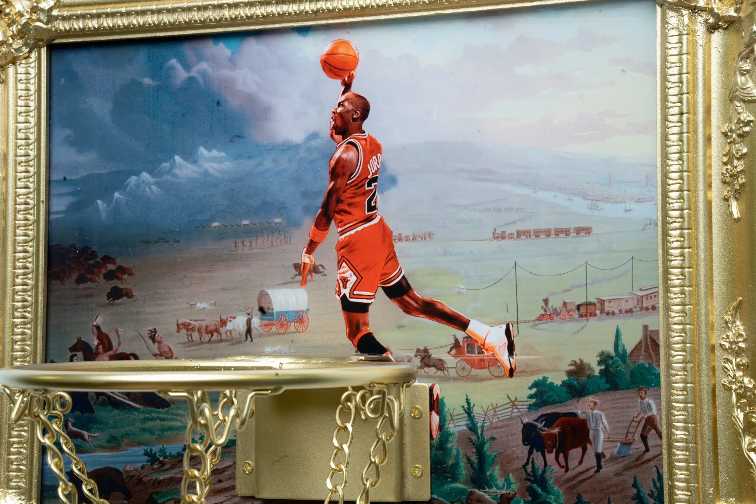 A painting of the Manifest Greatness Hoop encased in a gold frame.