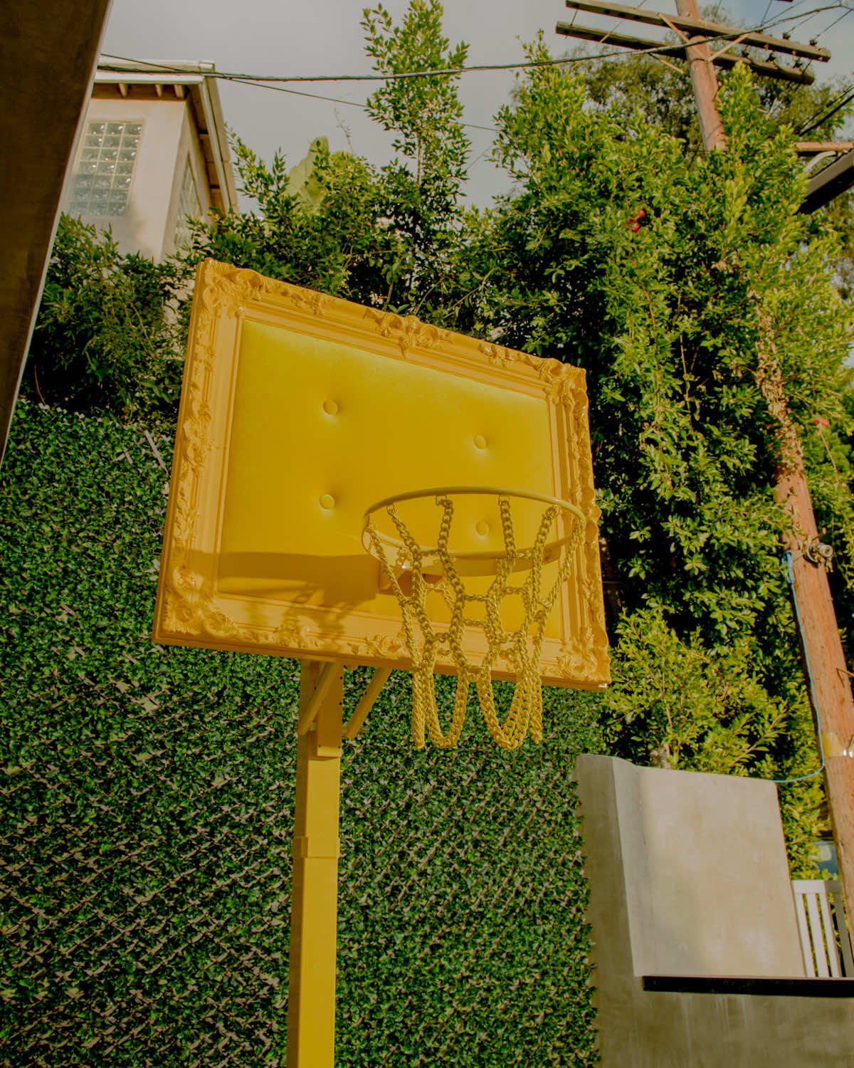 A yellow basketball hoop.