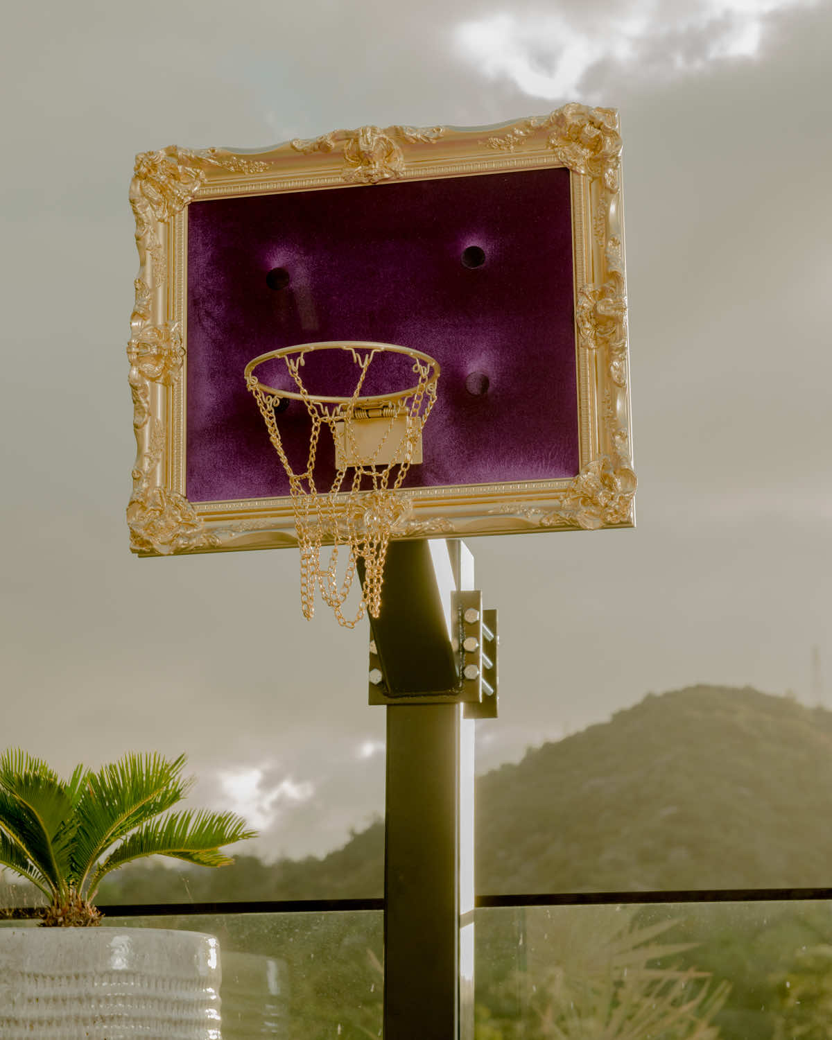 A basketball hoop with a purple frame.