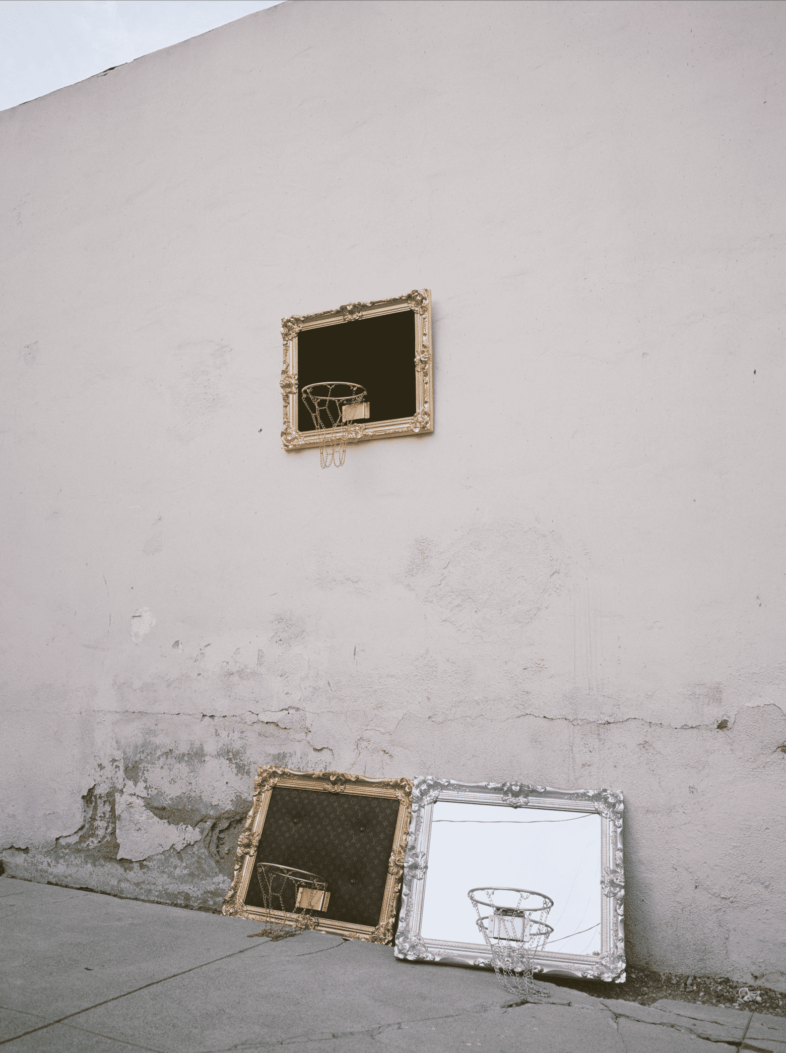A picture of a basketball hoop on a wall.