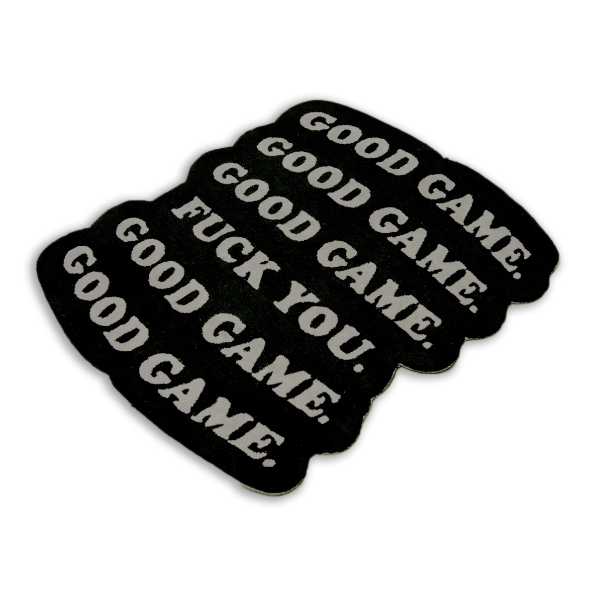 A black sticker with the words Rug - Good Game in bold print.